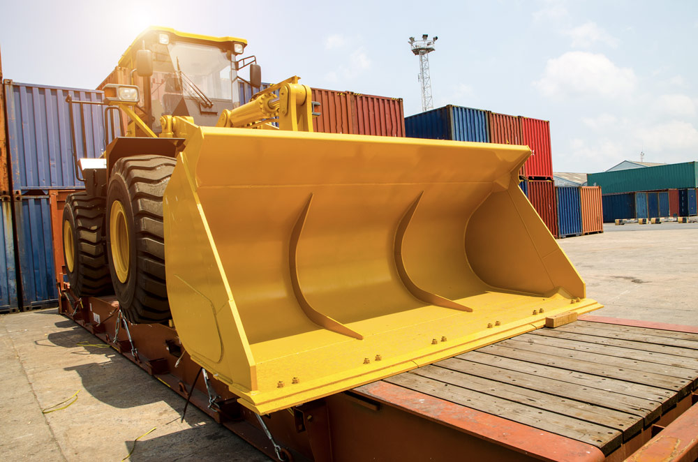 En stor gul grävmaskin